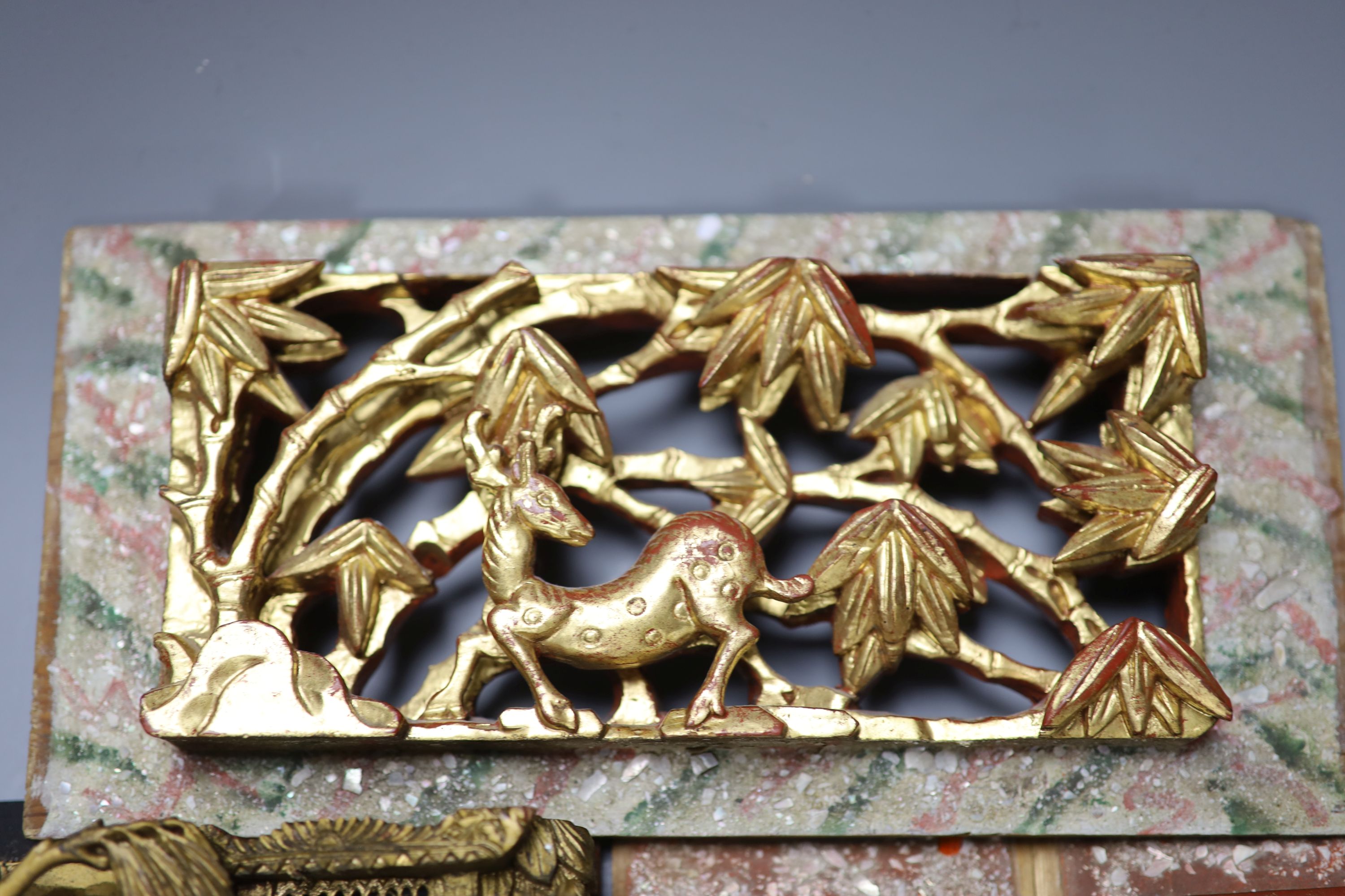 Five Chinese lacquer carved panels, longest 42cm